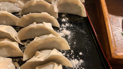 A series of dumplings being made