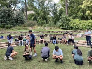 Hindi students playing Kho Kho in Duke Gardens