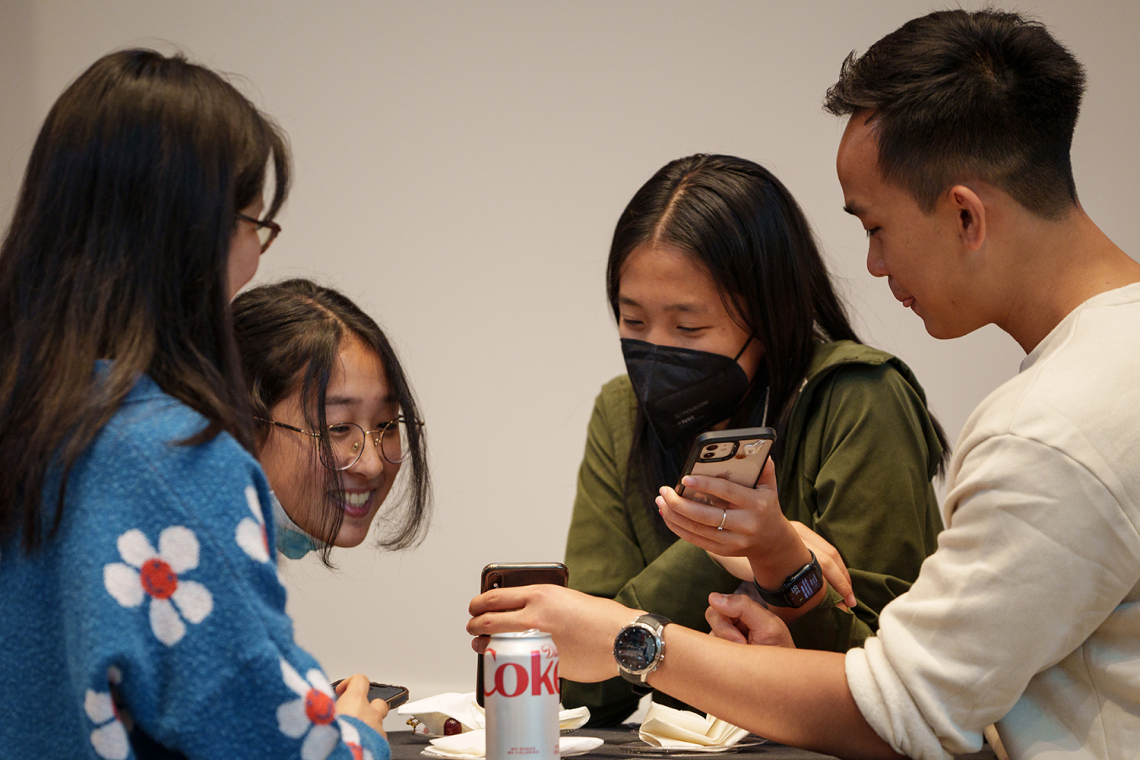 4 students at table