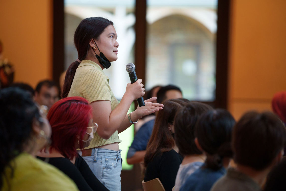 Student with microphone